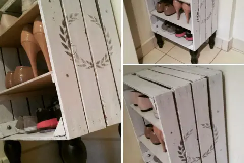 Biała, drewniana szafka na buty z ozdobnym wzorem, z różnymi rodzajami obuwia na półkach.