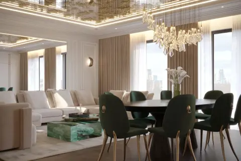 Elegancki salon z jadalnią. Złoty, ozdobny sufit napinany w jadalni, który może mieć wady, ale wygląda efektownie.
